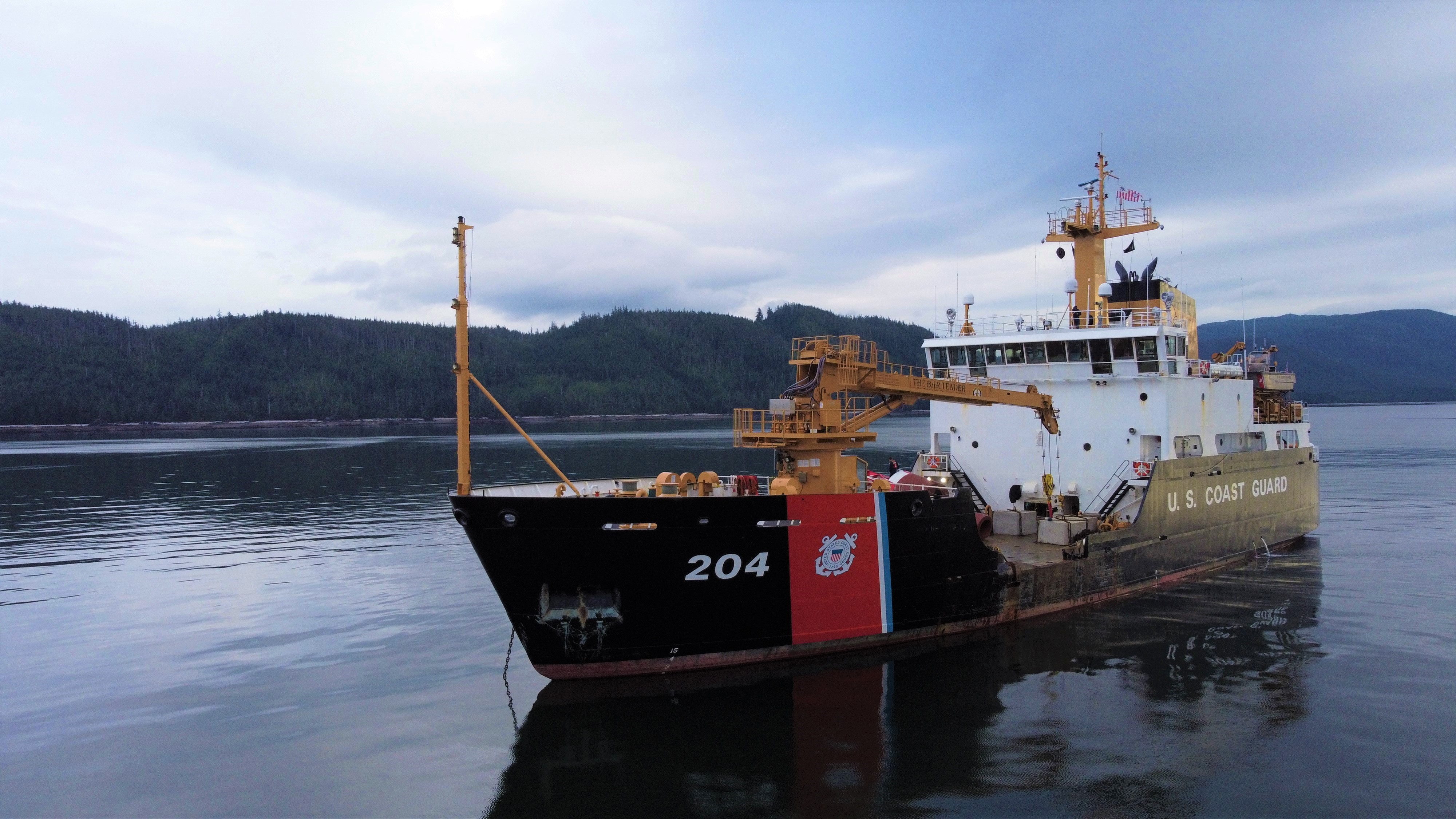 U.S. Coast Guard Cutter Fir (WLB 213) and lighthouse U.S. Coast Guard Cutter Fir (WLB 213) and lighthouse